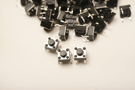 Black electronic buttons on a white background. Electronic elements. Power buttons.
