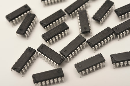 Microchips in a DIP case on a white background. A microelectronic element. Black microchips.の写真素材
