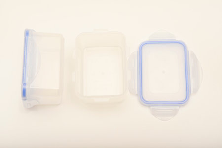 Small containers for food. Two plastic containers with a blue lid for food on a white background.の写真素材