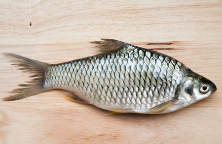 a fish paste on the wood