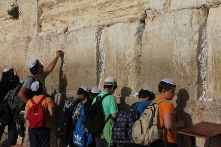 Unidentified young jewish students  are praying at the Wailing wall  Western wall のeditorial素材