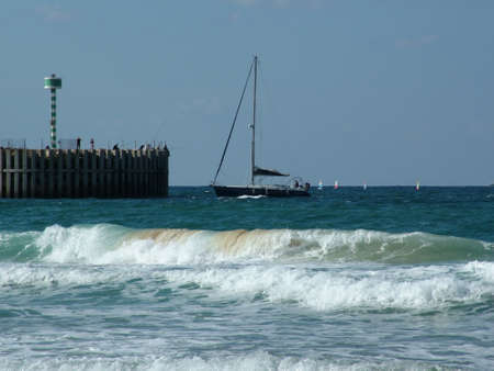  Yacht on sea open space   Waves by the sea の写真素材