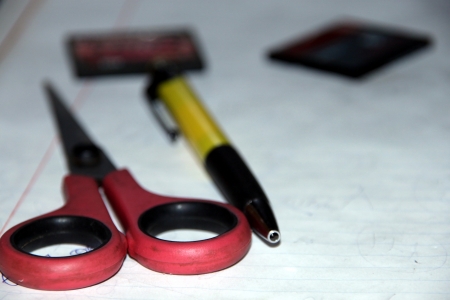 Scissors and a ballpoint pen. Selective focusの写真素材