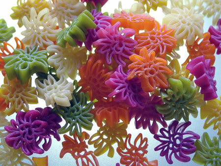 Colored pasta illuminated from behind