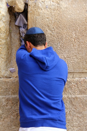 Jewish worshiper  pray at the Wailing Wall an important jewish religious site   in Jerusalem, Israel のeditorial素材