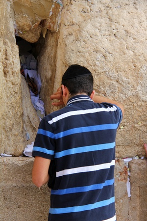 Jewish worshiper  pray at the Wailing Wall an important jewish religious site   in Jerusalem, Israel のeditorial素材