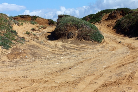Motocross and autosport track on blue sky backgroundの写真素材