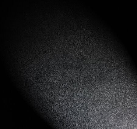 A black leather background pattern  Selective focusの写真素材