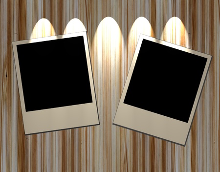 Blank old picture frames  on wooden backgroundの写真素材