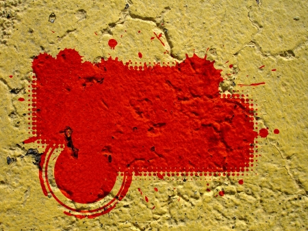 The red spot on the yellow wallの写真素材
