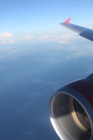 Beautiful view above the earth at the clouds belowの写真素材