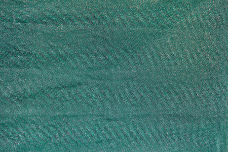 Green fabric textured background