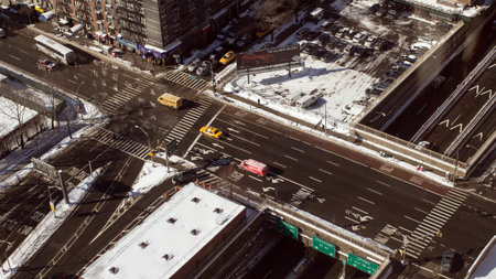 Bird s-eye view on the snowy winter deserted streets of Manhattan