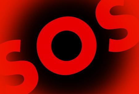 Red SOS word on black background with red vignetteの写真素材