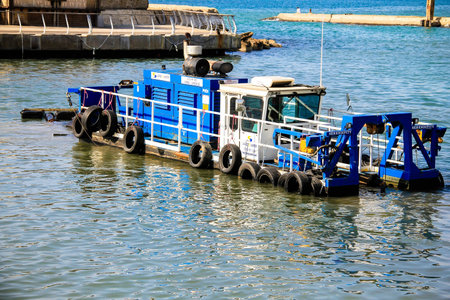 Dredge in the old port at Mediterranean sea. Tel Aviv.Israel