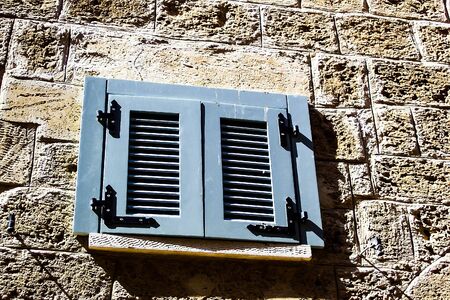Windows with shuttered  in stone wall of  Old Jaffaの写真素材