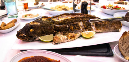 Grouper baked in the oven at the banquet table