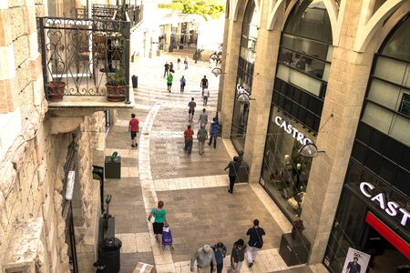 Shoppers and tourists at Mamilla shopping street. Located by Jaffa gate, Mamilla Avenue, is an upscale shopping street and the only open-air mall in Jerusalem. Israelのeditorial素材