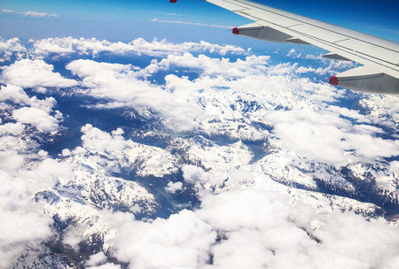 Flight over the Alps, Flight over the Alps, snow-capped Alpine peaks visible glacier. Italy