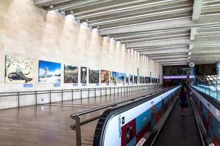 Unidentified passengers at horizontal escalator at Ben Gurion Airport. Tel Aviv. Israelのeditorial素材