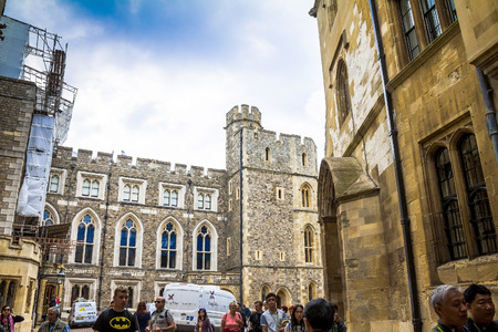 Unidentified visitors inside medieval Windsor Castle. Windsor Castle is a royal residence at Windsor in the English county of Berkshire. It was built in 1066 by William the Conqueror and it is the longest-occupied palace in Europe. UKのeditorial素材