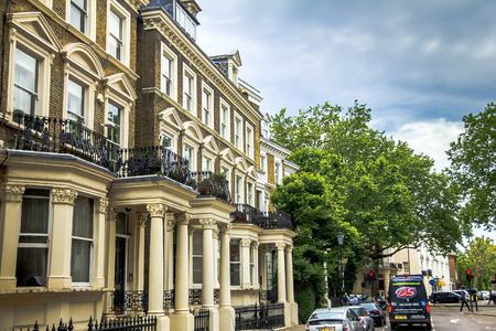Old  large apartment  houses  in Kensington Olympia district, London, England, United Kingdom.のeditorial素材