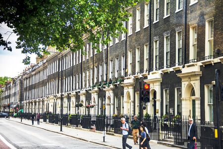 Unidentifaid people near Arosfa hotel. Arosfa Hotel occupies was built 200 years ago, Georgian townhouse situated in the historic Bloomsbury district. London, UKのeditorial素材