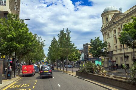 Great Eastern Street in Kensington Olympia district on the normal working day at evening time. London, England, United Kingdom.のeditorial素材