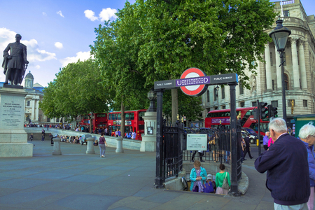 Tourists visit Trafalgar Square  . One of the most popular tourist attraction on Earth it has more than fifteen million visitors a year. London. UKのeditorial素材