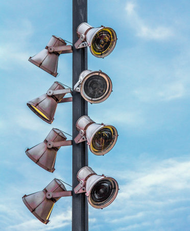 Pillar with outdoor lighting  lanterns on  blue sky background  at sunset time