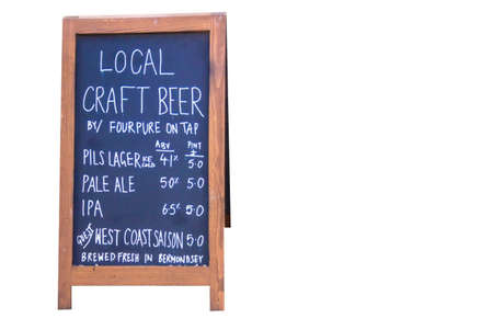 LONDON, UK - JUNE 6, 2015: Advertising of draft craft beer sale near pub on the south bank of the River Thamesのeditorial素材