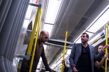 LONDON, UK - JUNE 7, 2015: Unidentified people  inside  train at the King's Cross underground...