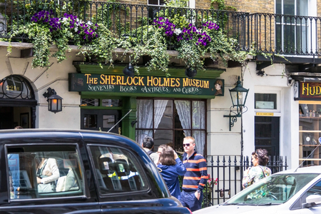 LONDON, UK - JUNE 6, 2015 - Facade of the Sherlock Holmes house and museum in 221b Baker Street. Here is where Arthur Conan Doyle located the studio of the famous detective.のeditorial素材