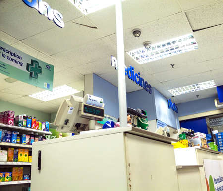 LONDON, UK - JUNE 7, 2015:   Interior of old drug store with bar stools at Baker street.のeditorial素材