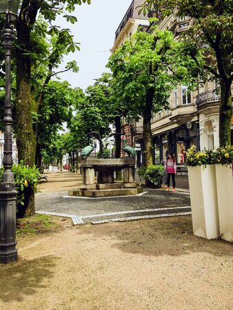 BADEN-BADEN, GERMANY - CIRCA MAY, 2016: The Reiherbrunnen (Herons Fountain) is a thermal water fountain in the Sophienstraße. The Karlsruhe sculptor Karl Albiker (1878-1961) designed the fountain in the Art Nouveau styleのeditorial素材