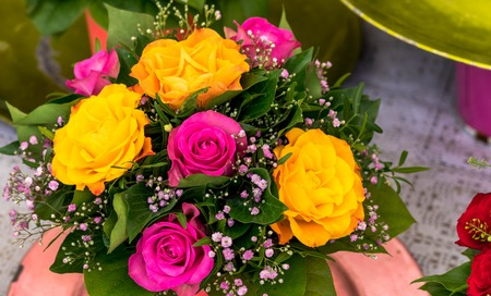 Bouquet of different color roses in flower shop on open air at small city market. Salzburg, Austriaの写真素材