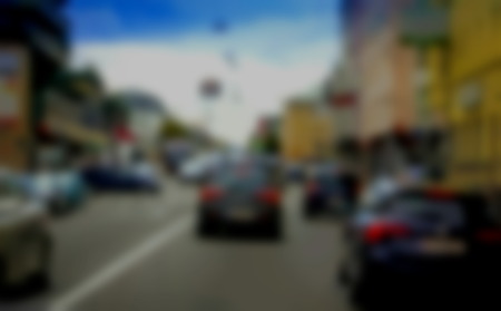 Blurred view of busy traffic on one of the main streets of the cityの写真素材