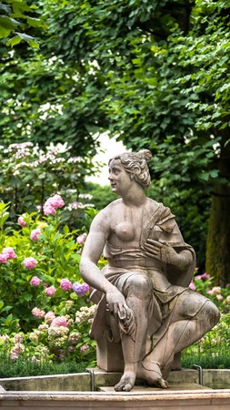 Susannabrunnen (Susanna fountain) - statue of young half naked woman startled by someones presence while bathing. Created by Hans Waldburger, 1700. Mirabellgarten (Mirabell garden), Salzburg, Austriaのeditorial素材
