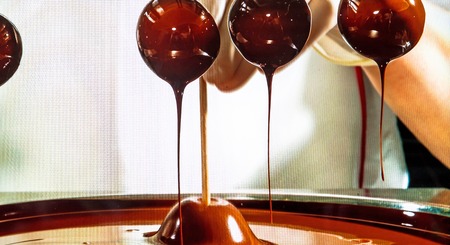 Salzburg, Austria - July 15,2017: Showcase of The Mozartkugeln shop. An old photo showing the details of the production of the famous Austrian sweets "Mozart" in 19th centure.のeditorial素材