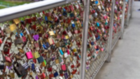 Love locks on bridge . Blurred viewの写真素材
