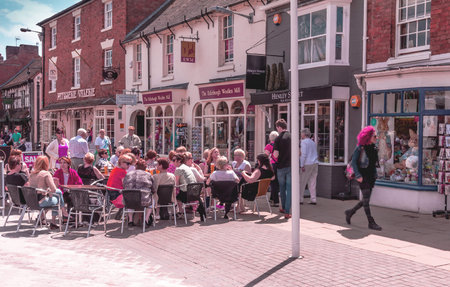 STRATFORD-UPON-AVON, UK - JUNE 8, 2015: Unidentified tourists at Henley Street in the center of Stratford Upon Avon, Warwickshire. England, United Kingdom, Western Europeのeditorial素材