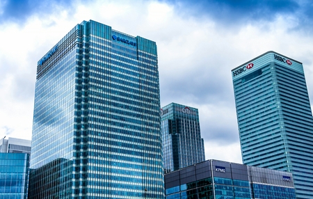 London, England- June 9, 2015 : Offices in the financial hub of Canary Wharf at Canada square: HSBC, CITI, JP Morgan, KPMG and Barclays buildingsのeditorial素材