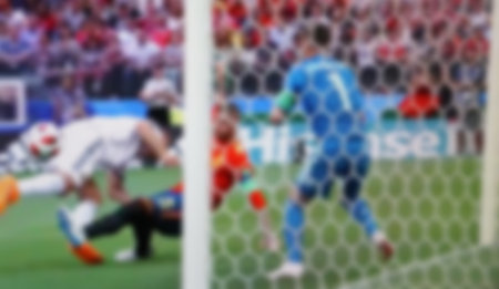 Football. Falling forward after a goal scored to the opponent. Blurred viewの写真素材