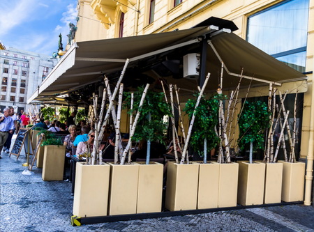 Prague, Czech Republic -July 23,2017: Small street restaurant on Republic Square (Namesti Republiky) in Old Town (Stare Mesto) near shopping center Palladiumのeditorial素材