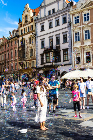 Prague, Czech Republic -July 23,2017: Street performer making bubbles to entertain people at Staromestske namesti Old Town Squareのeditorial素材