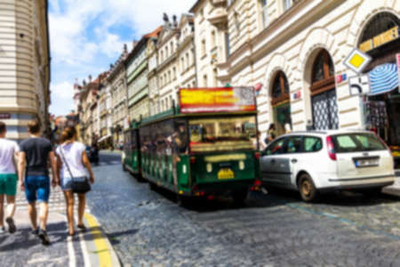 Prague, Czech Republic. Blurred view of tourist train on the medieval street of the old part of the city, Mala Stranaのeditorial素材