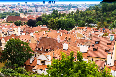Summer aerial view of the Old Town architecture with red roofs and church of Saint Nicholas in...