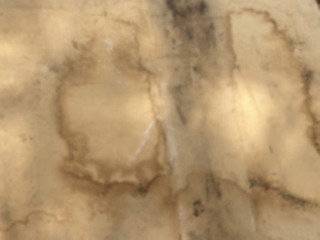 Grunge light brown dirty cardboard sheet blurred texture background for your design
