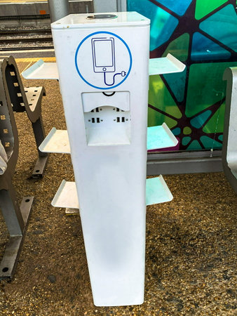 Free charging station for mobile phones in modern airportの写真素材