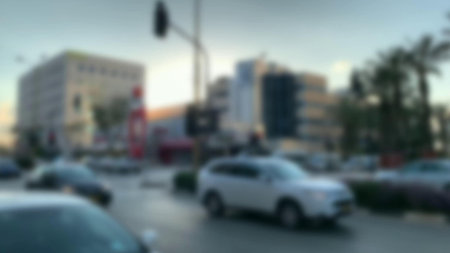 Transport situation at one of the busy city crossroads. Blurred view.の写真素材